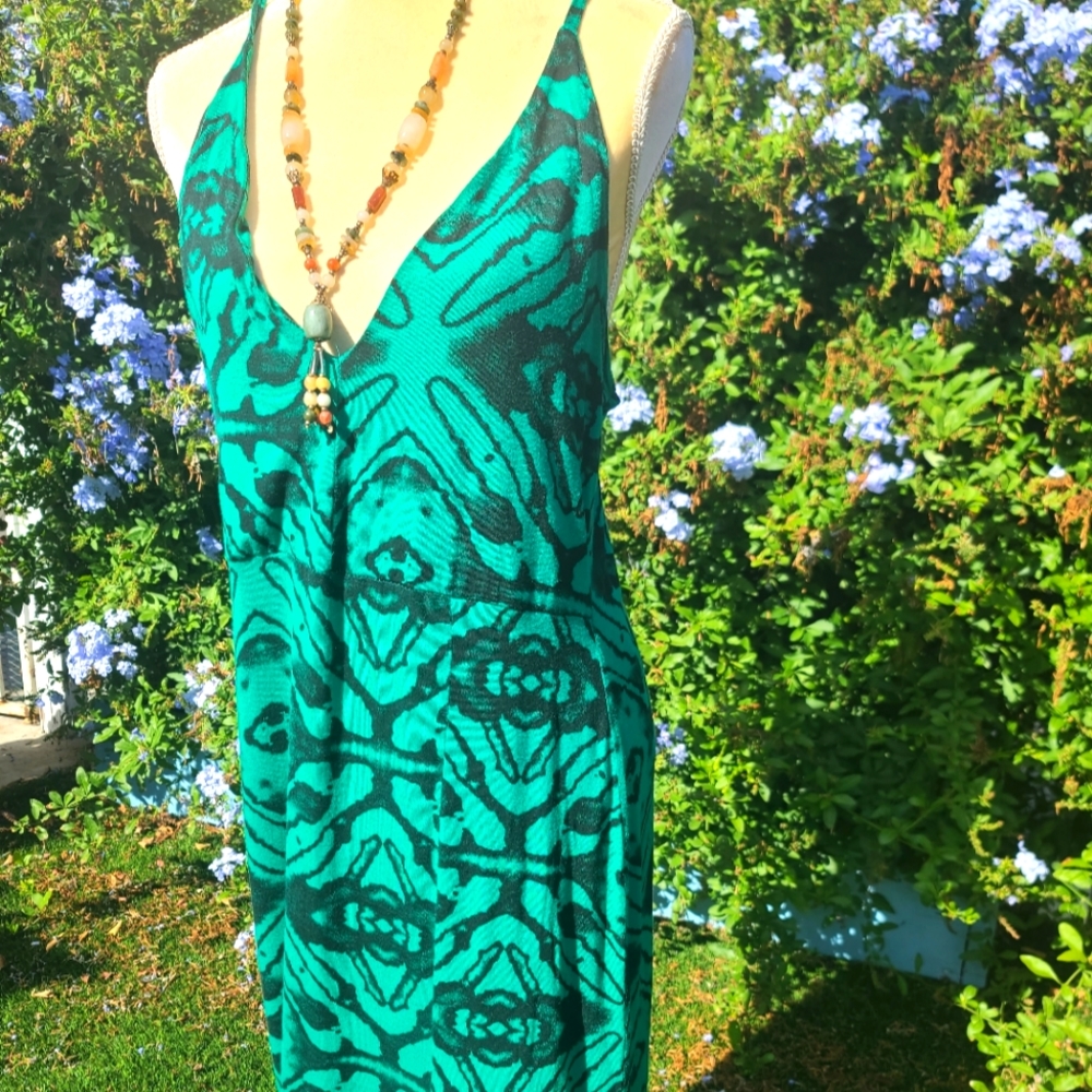Spaghetti dress w/ slit down the middle a patterning black water color on green